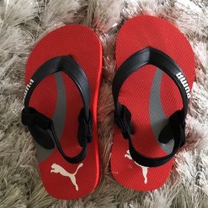 Puma flip flops with straps